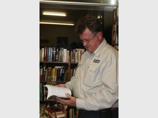 Willem Prinsloo enjoys his latest read.