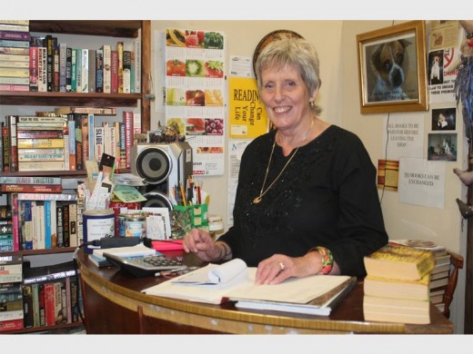 Pat Palmer, a volunteer at the Friends of Rescued Animal's (Fora) bookshop handling all the sales of the evening.