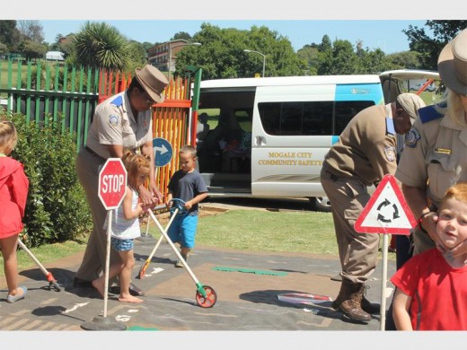 Mogale City Traffic Department officials training the drivers of tomorrow on a carpet track.