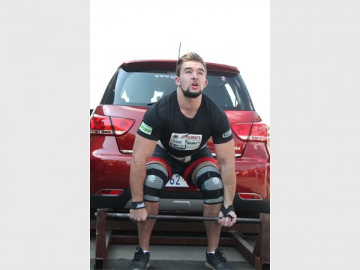 Terence Bosman getting ready to lift the car at President Hyper.