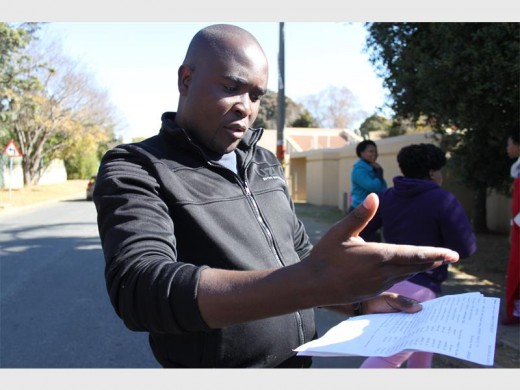 Andrew Ncube, a Noordheuwel Heights resident, with the Mogale City invoice showing the Heights owing Mogale City about R900 000 in water and electricity rates.
