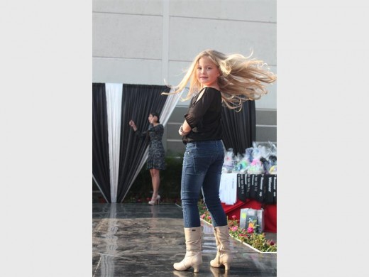 Hair flew as this participant strut her model moves on the catwalk.