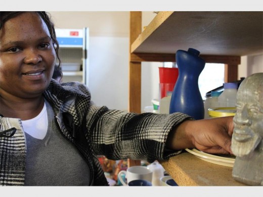 Josephine Moeng, one of the two employees who came up with the idea to open the second hand shop to generate a steady income.