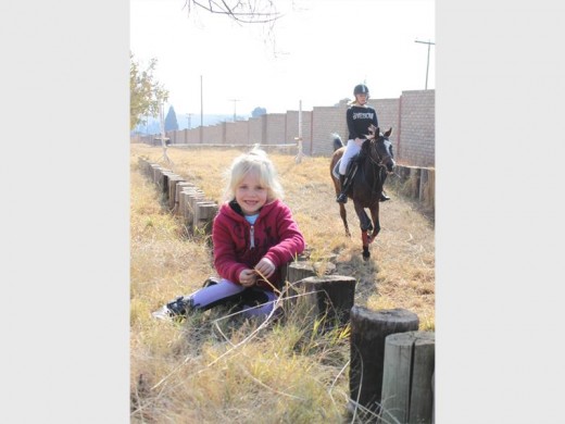 Nulé Steyn's six-year-old sister, Tamlyn (front), shares her sister's passion for horses.