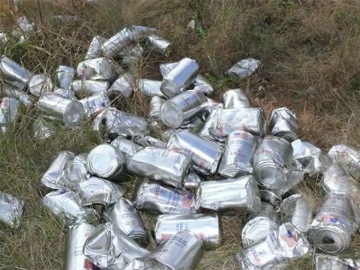 Some of the USAID 4liter oil cans that tumbled from a runaway truck that disappeared from a Johannesburg warehouse.