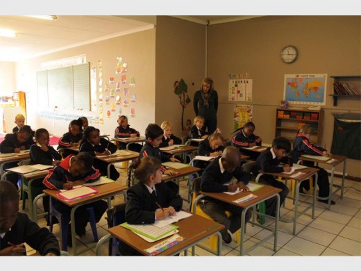 Nelmarie Verwey teaches her Grade One class about Mathematics.