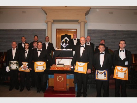 The Freemasons dressed in their very neat tuxedos, black shoes and aprons