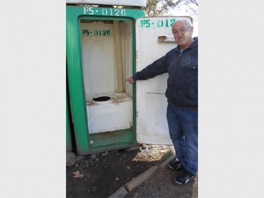 Eric van Lelyveld is disgusted with the state of the mobile toilets that are used by women, men and children of Makhulugama.