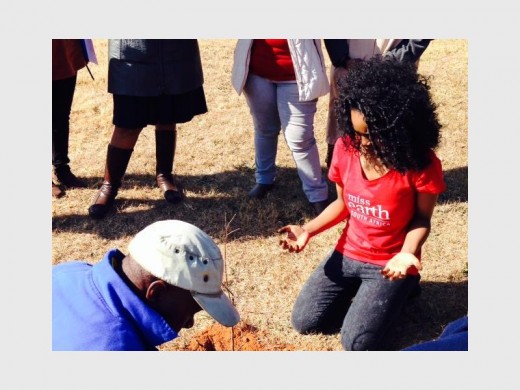 In her jeans and T-shirt, Mandisa gets her hands dirty while planting one of the 10 trees at Silverfields Primary School.
