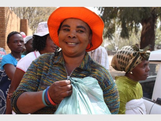 Millicent Ngcobo, living in Makhulugama Informal Settlement for 17 years, is rather dependent on food parcles like these.