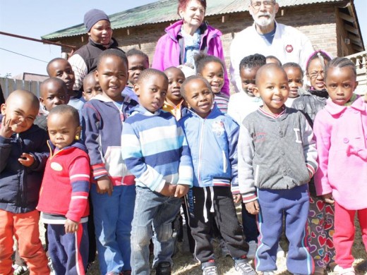 The Little Graduates Nursery School's young karatekas with sensei David Krause and principal Suzette Green.