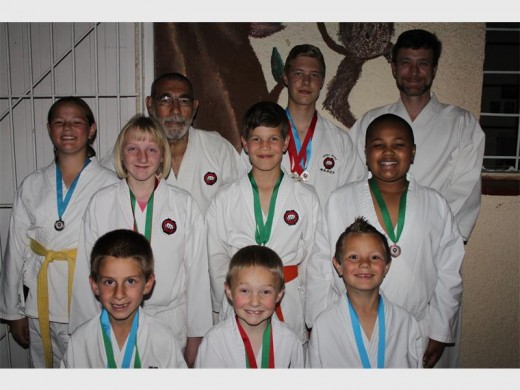 Back row, from left: Sensei David Krause, Galen Krause, Sensei Eugene van Staden. Middle row, from left: Mia Bruun, Chanél Greeff, Marcus Krause, Queron Bemiedie. Front, from left: Christiaan Lambrecht, Nathan van den Berg and Carter Bruun.