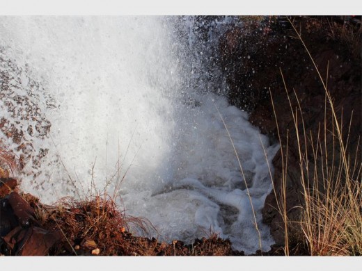 The force of the water burst the ground about three metres in circumference, open.