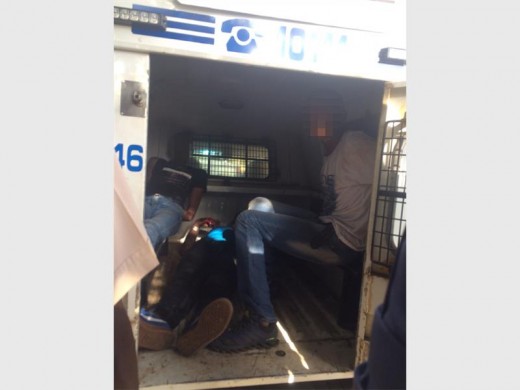 Three house robbers were handed over to the police after they were stopped in their tracks.