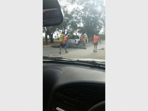 A resident captures the CPF picking up after the protest on Tom Muller Street.