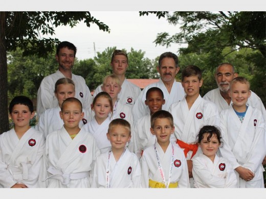 The Goju Ryu Krugersdorp Karate Club met the chief instructor sensei Arnold de Beer (top, second right).