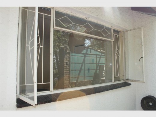 The window was broken by the tenant after he tried to get access to the property after he was released on bail.
