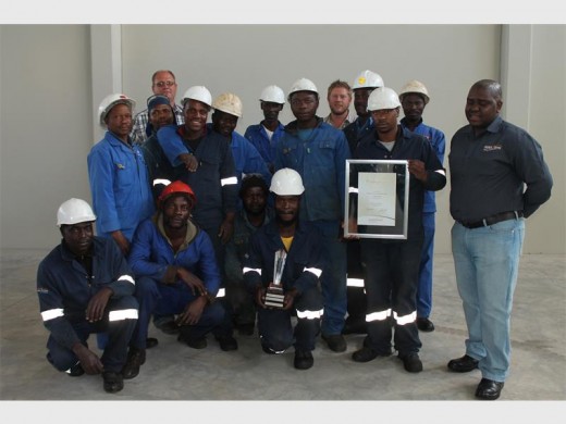 Staff of AGO celebrate after winning the Makrosafe Health and Safety Award in their category.