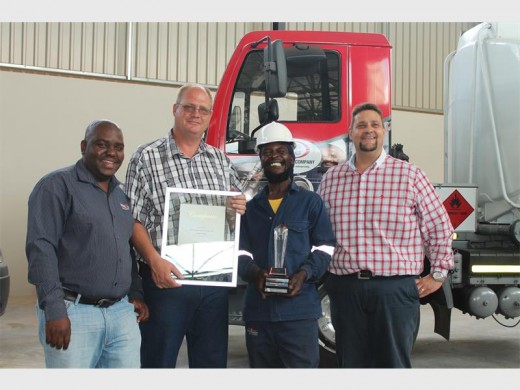 Proud employees Sibusiso Mnisi, Willem van Wyk, George Mngevu and Johnny Terblance.