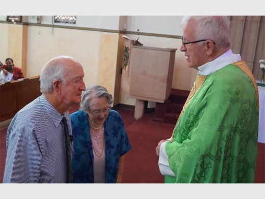 Mick and Mary Dennehy receive the Benemerenti Papal Medal at the Holy Rosary Catholic Church.
