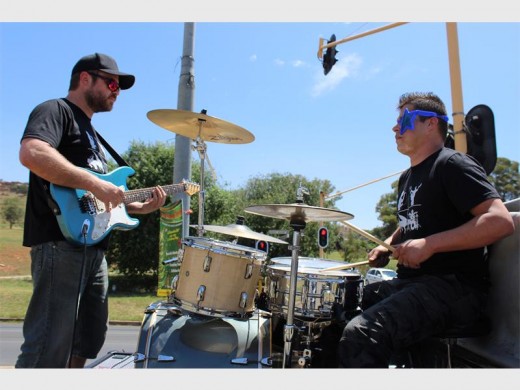 Mark (right) drumming away with his band mate next to Robert Broom Dive.