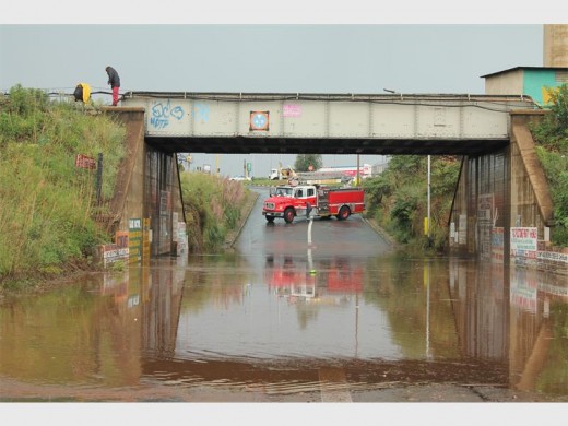 Road closed as emergency services jumps in to help free a stuck vehicle.