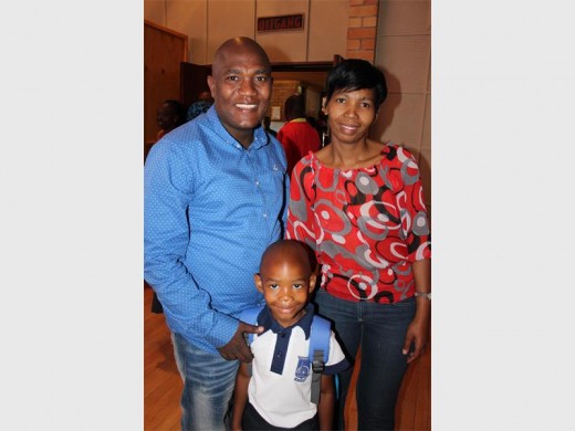 Buti (left) and Masechaba (right) are very proud of their son, Sechaba Mofokeng, on his first day of school.