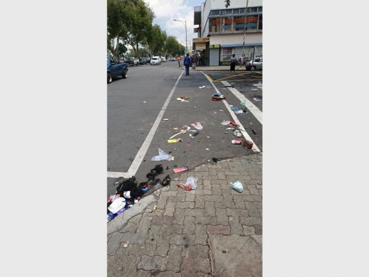 The town to pieces of rubbish after protesters took to the streets.