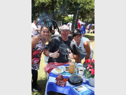 Allen Ridley was glad to taste the international dishes with his friends Lisa Erwee (left) and Lynne Erwee (right).