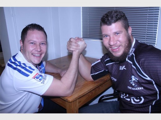 Clinton Botha, a huge Stormer supporter and Ennes Steyn, a Shark supporter, get into some friendly competition before the Super Rugby season kicks off.