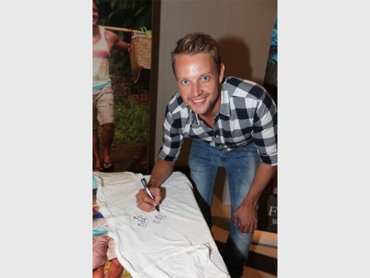 Ivan signing a fan's T-shirt.