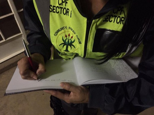 A signed book was handed over to Oom Johnny's family as a gift from Sector 8.