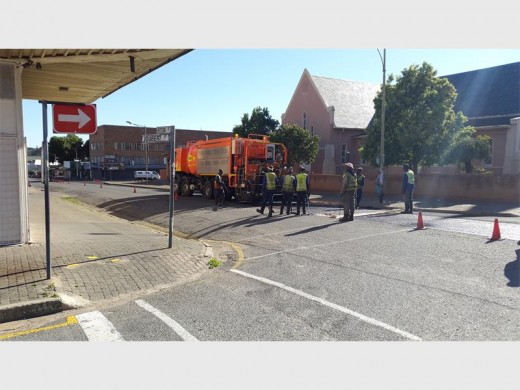 New tar being laid in Rissik Street in Krugersdorp's CBD as part of the planned road repairs.