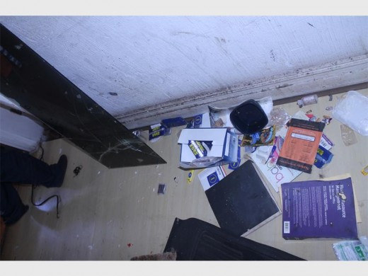 Condoms decorate the floors of the house in Luipaard Street.