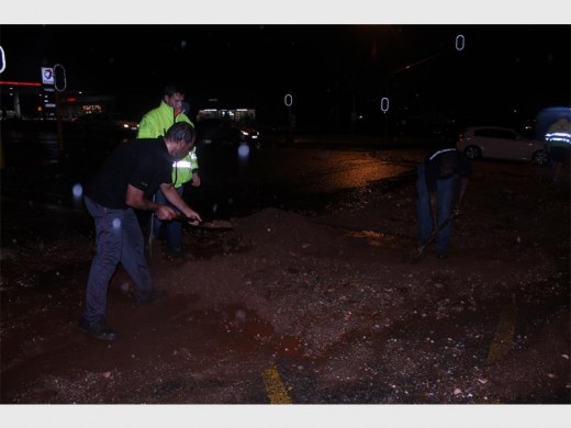 Members of the Sector 3 Community Policing Forum clean up Van Riebeeck Road.