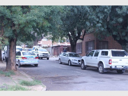 Police vehicles surrounded a block of flats in Sivewright Street following a secret operation.