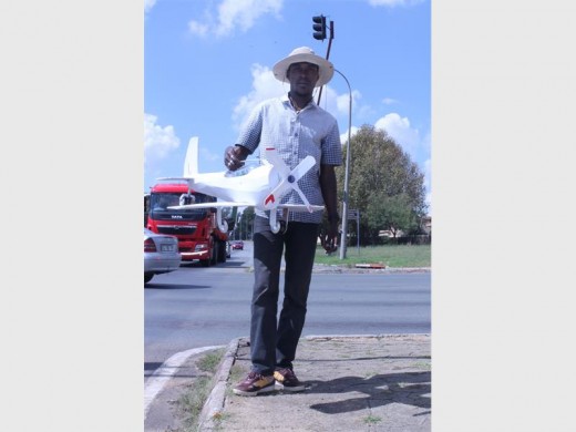 Mike Hayman makes model airplanes from cardboard, plastic bottles and cans.