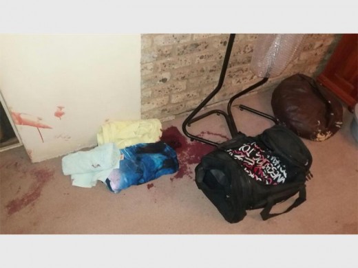 Packed bags were found ready to be stolen after the homeowner shot a house robber.