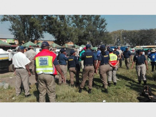 Superintendent Mosito Mphaphathi addressed the just over 50 officers’ before the operation began.