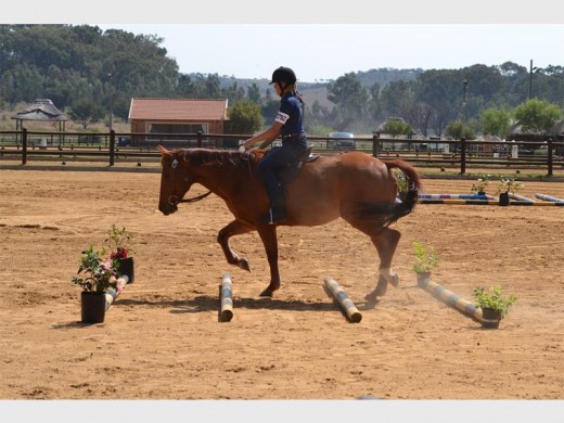 Dane Steyn, from Laerskool Krugersdorp-Noord, riding the trail class on Amigo.