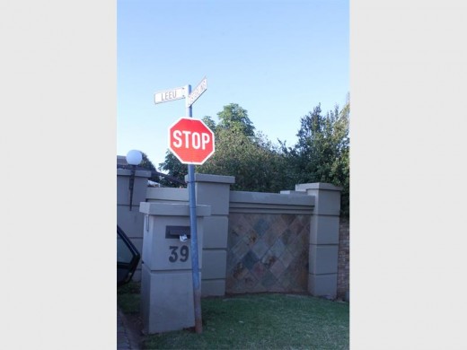 A stolen stop sign and street sign were also planted in Johan's front lawn.