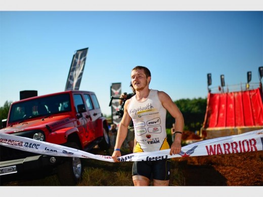 Michael Joubert nearing the finish line for the Black Ops Elite obstacle course. He completed the course with the winning time of 1:37:30. Photo by: ZC Marketing Consulting.