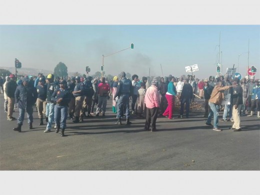 Protest action and burning tyres caused certain roads to be blocked this morning. Photo: Submitted
