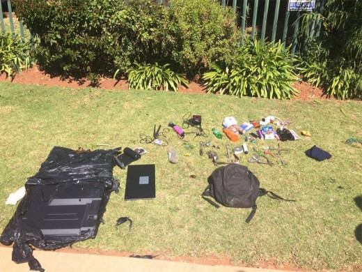 The stolen goods in the suspect's possession.