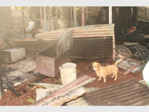 Daar is net rommel en as oor na die brand by die Cheetham-gesin se woonstel.