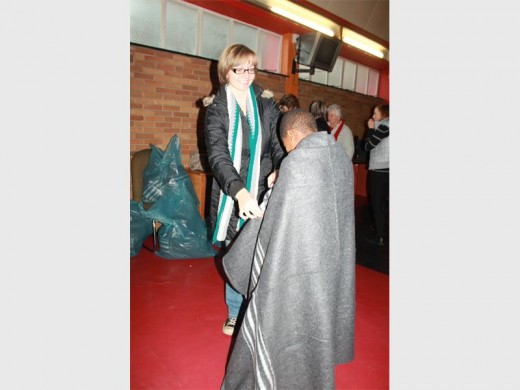 Elri Mitchell spreading warmth as she hands out blankets at the Ikusasa Development Centre.