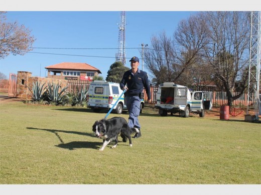 Sergeant Rohloff and his special sniffer dog, Baily, ready to sniff out suspects carrying drugs.