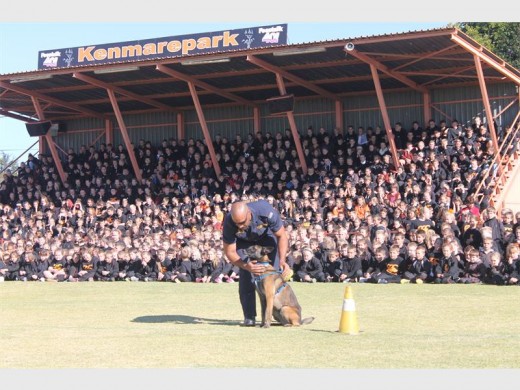 Sergeant Sechel's four-legged best friend friend, Wimpy getting ready to put on a show for the pupils.