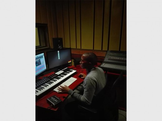 Luthando in studio, doing what he loves.