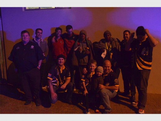 The Round Table crew with two of the men who received blankets.